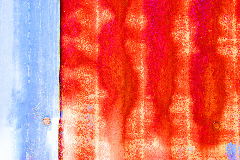 tin walls, corrogated metal, tin hut, red and blue