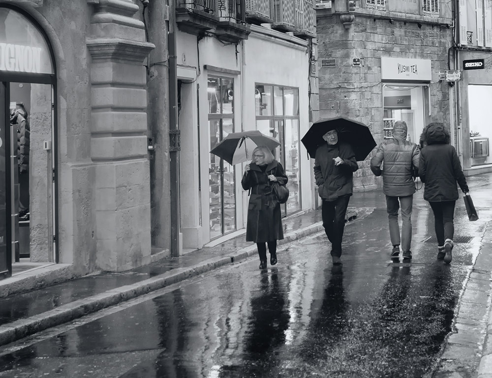 rainy street, umbrellas, france