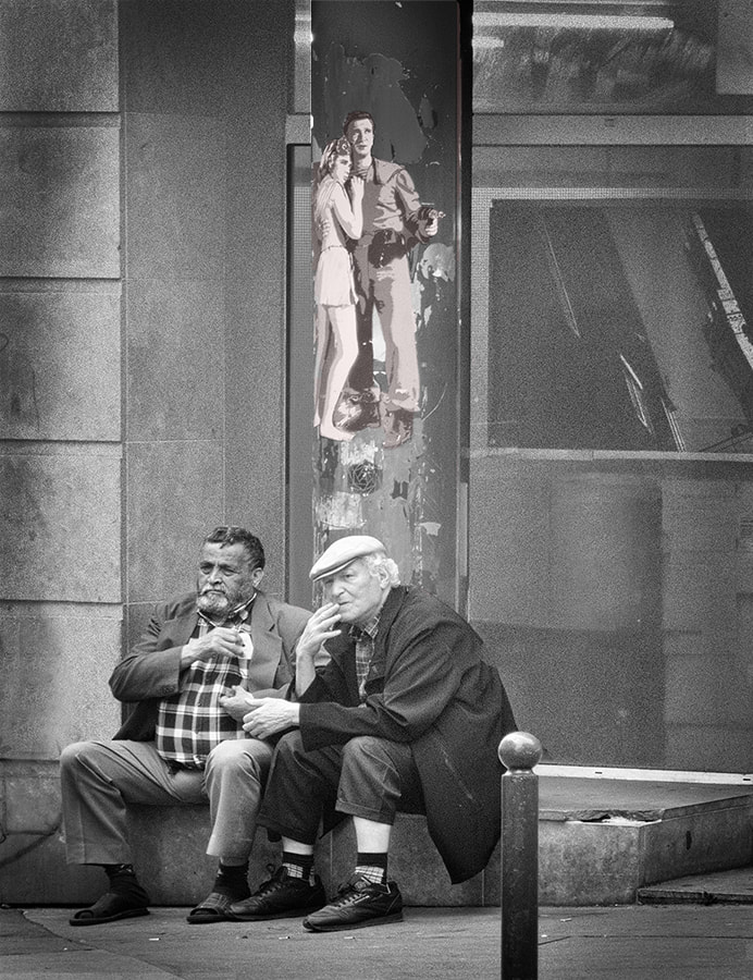 Two men in Paris, street art.
