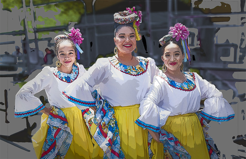 Three women dressed for Mexican dance.  Carnival in San Francisco