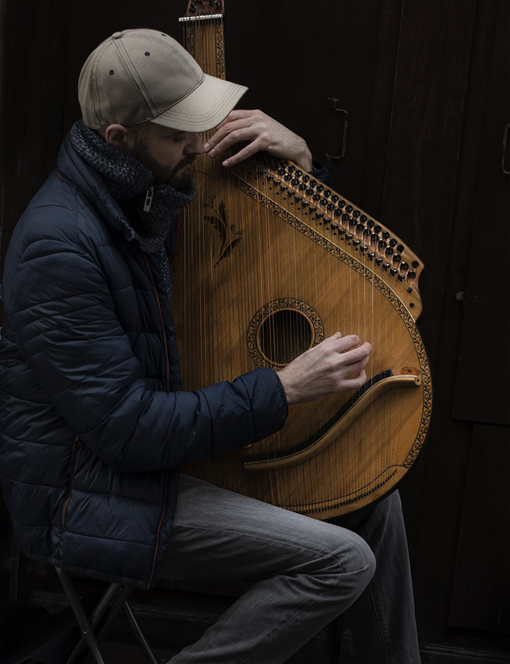 street musician with ukrainian guitar